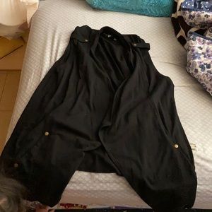 Black sleeveless cardigan with gold detailing never worn